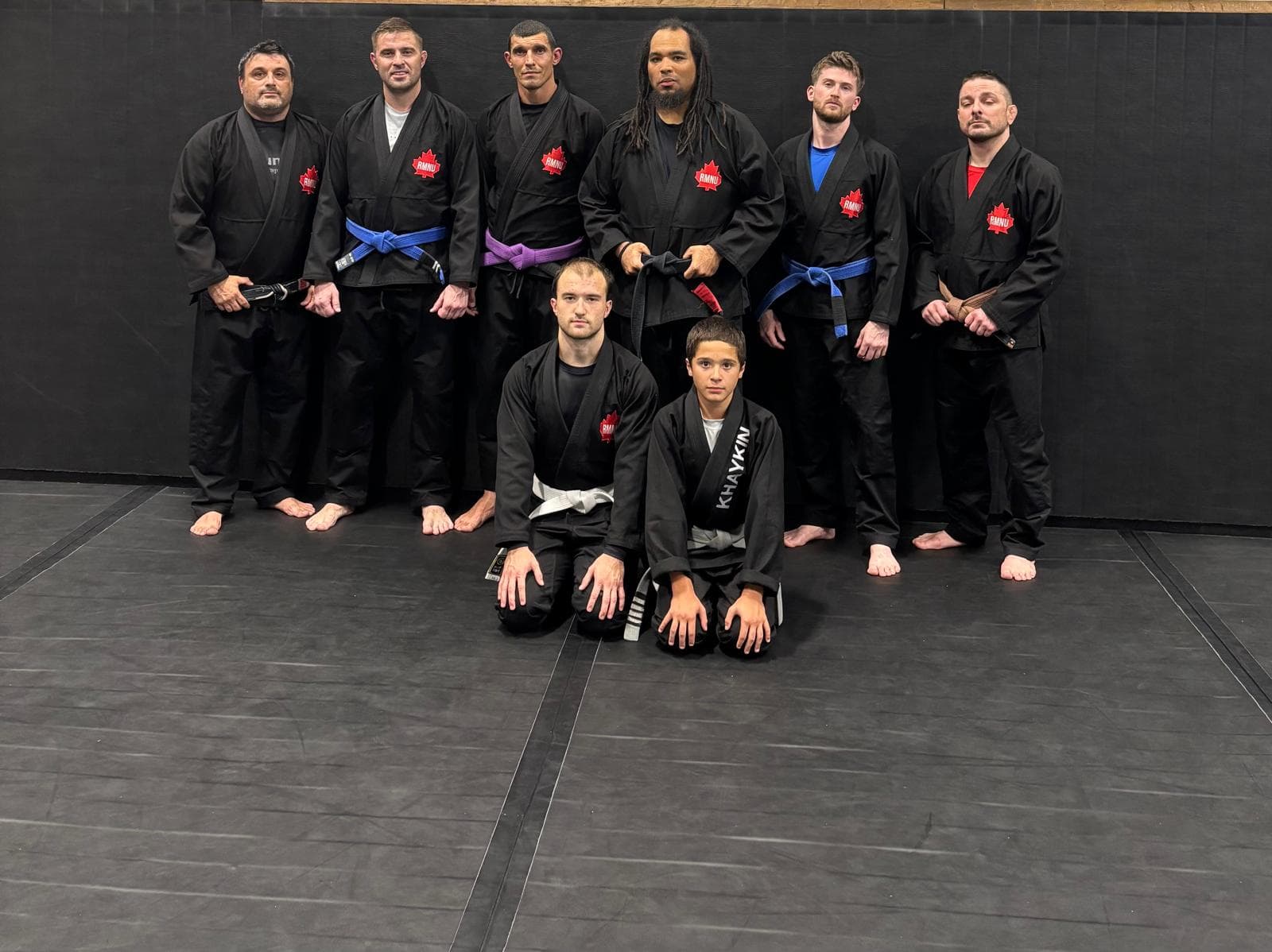 Domenic Passero with members of the United Grappling Club gi team